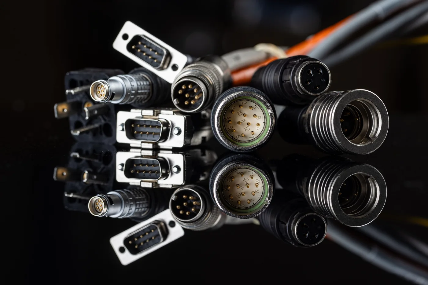 Various industrial connector systems on cable assemblies