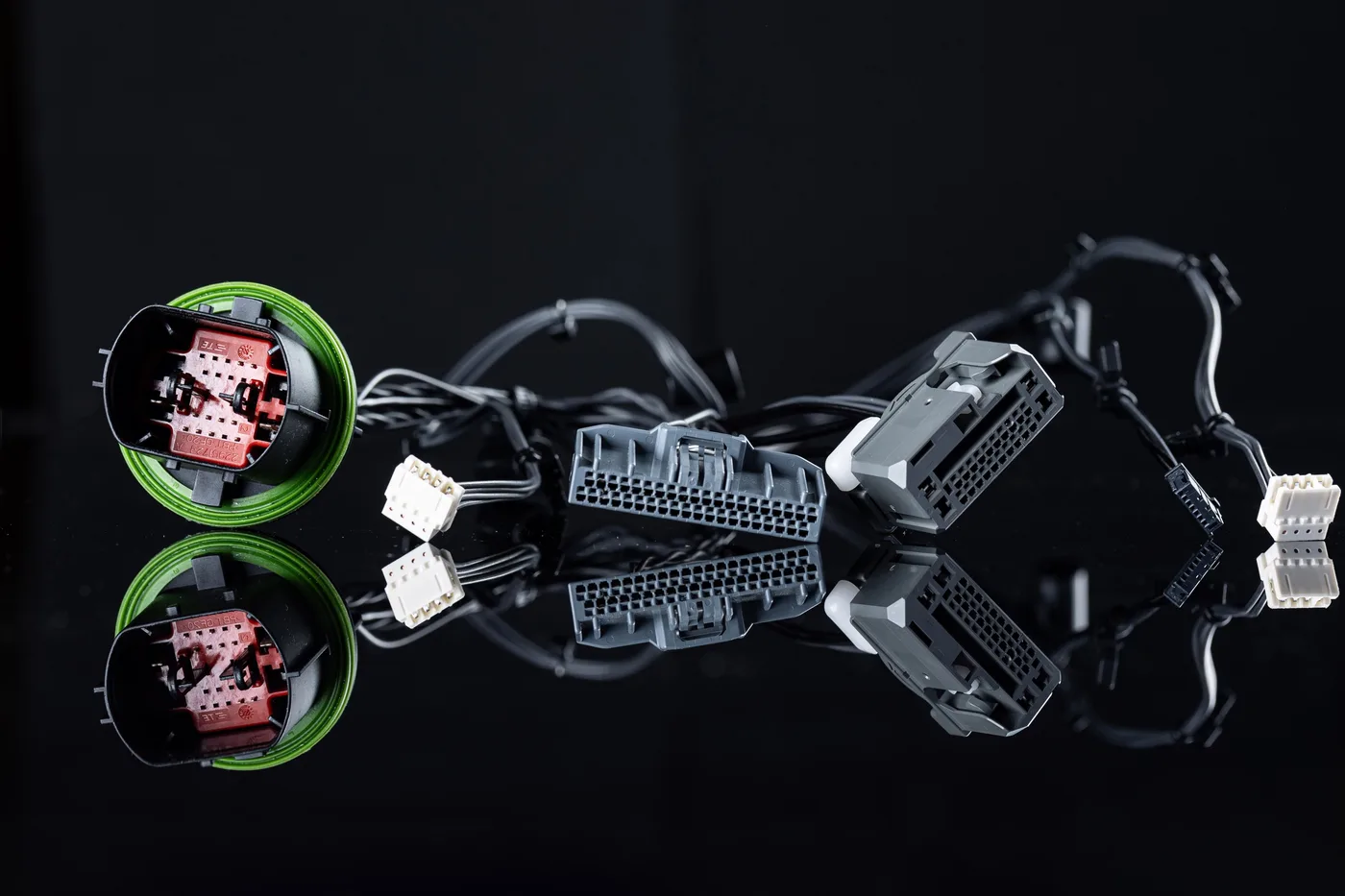 Cable harness with multiple connector systems